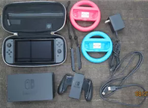 NINTENDO SWITCH HAC-001 32GB HANDHELD GAMING CONSOLE WITH EXTRAS - Picture 1 of 6