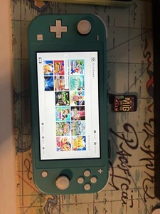 Nintendo Switch Lite With Games. - Picture 1 of 2