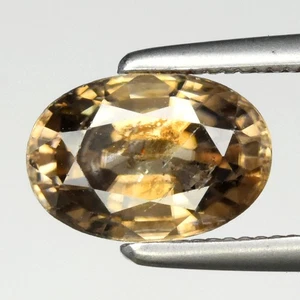 π 1.69ct Oval Natural Champagne Yellow Zircon - Unheated, Tanzania Gemstone - Picture 1 of 4