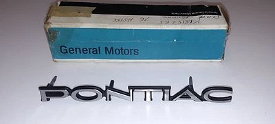 GM 1975-1977 Pontiac Grill Ornamento Emblema Nuevo de Lote Antiguo Parte # 498287  Foto 1 de 4