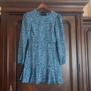 Kleid Mia Blau Gepardenmuster - Bild 1 von 4