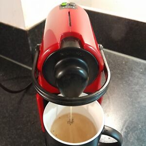 Krups Nespresso coffee machine in red. Used, but still in good working order. 