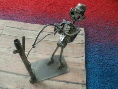 Arte steampunk de pescador de metal - Imagem 1 de 4