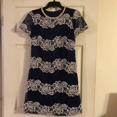 Jessica Simpson Navy Blue Dress With White Flower Accents. Lace With Gold Trim. - Image 1 of 4