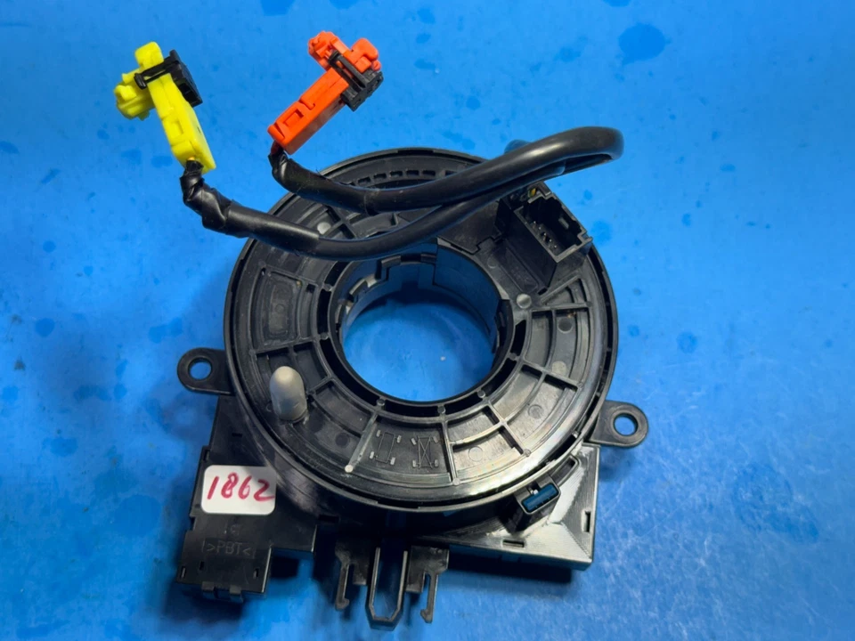 Reloj Nissan Rogue 2017-2020 resorte OEM Foto 1 de 4