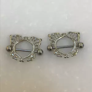 PAIR OF ANGEL WING NIPPLE SHIELDS RINGS BARBELLS NEW 14 GAUGE SURGICAL STEEL - Picture 1 of 1