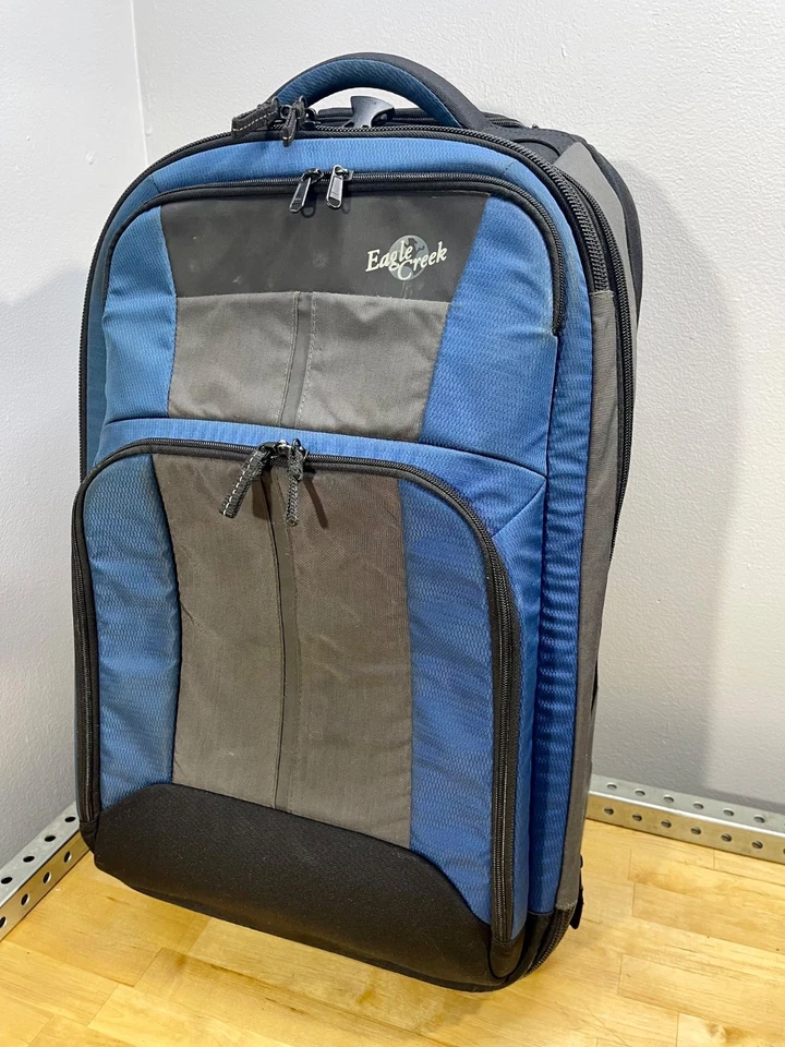 Maleta de equipaje vertical con ruedas Eagle Creek Hovercraft 22 azul/negro rei viaje Foto 1 de 4