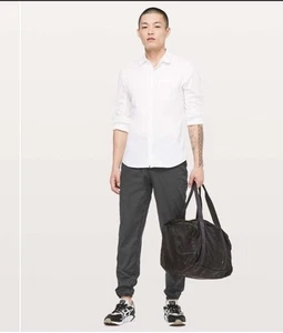 Lululemon Large Great Wall Herrenhose 32" Schrittlänge schwarz Slipper Kordelzug Jogginghose - Bild 1 von 12