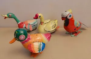 4 giocattoli vintage in latta uccellino anatra cigno pappagallo oca avvolgimento GIAPPONE CINA *Leggi e vedi! - Foto 1 di 9