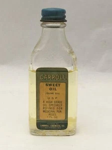 Botella Carroll Chemical Co Baltimore MD ACEITE DULCE con etiqueta, contenido y tapa - Imagen 1 de 4