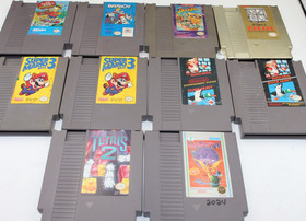 Lotto (10) Giochi Nintendo NES ROTTI; Mario 3 DuckTales Zelda Paperboy Simpsons...