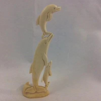 Delfín con sus bebés tallado a mano en hueso de camello macizo con excelentes detalles Foto 1 de 4