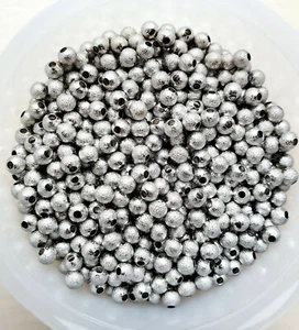 100 Stück Messing Sternenstaub Perlen versilbert 4 mm Zwischenperlen - Bild 1 von 5