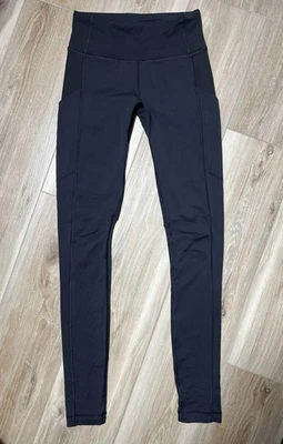 Lululemon Black Long Leggings With Side Pockets - Size 2 - Image 1 of 4