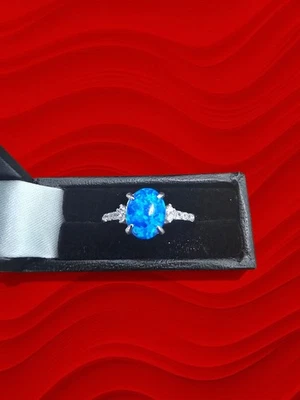 Precioso anillo de vestir estilo solitario de ópalo azul y plata de ley - varios tamaños Foto 1 de 4