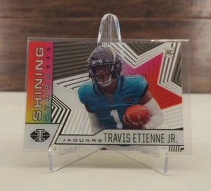 2021 Illusions #SS-20 Travis Etienne Jr. Shining Stars Rookie RC Jaguars - Bild 1 von 2