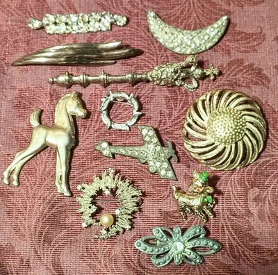 Lote de 11 broches vintage/antiguos en tono plata Foto 1 de 4