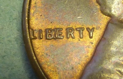 1957 LINCOLN CENT "BIE"  MINT ERROR  AU - Image 1 of 3