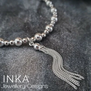 Inka 925 Sterling Silver 5mm bead Stacking Bracelet with a Tassel charm - Picture 1 of 9