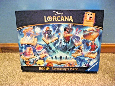RAVENSBURGER 1000 PC PUZZLE DISNEY LORCANA GLIMMERS OF THE REALM: SAPPHIRE LIVE! - Image 1 of 4