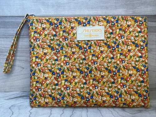 Tory Burch x Shiseido borsa cosmetica floreale arancione borsa con cerniera polsino