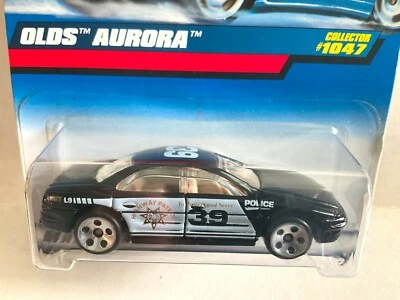 Hot Wheels POLICE CAR - OLDS AURORA - 1999 #1047 Highway Patrol - Thailand - Image 1 of 3