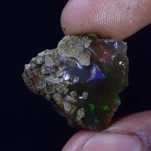 Olio di opale nero etiope 100% naturale 14,80 ct grezzo fuoco AAA+ pietra preziosa sfusa - Foto 1 di 9