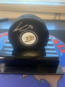Leo Carlsson Anaheim Ducks Autographed Hockey Puck - Picture 1 of 3