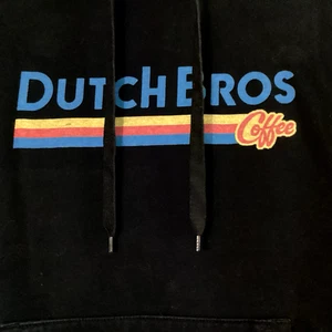 SUDADERA CON CAPUCHA HOLANDESA BROS COFFEE UNISEX NEGRA CON GRÁFICOS - Imagen 1 de 14