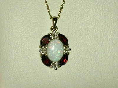 2Ct Oval Cut Fire Opal & Ruby Women's Pendant 14K Yellow Gold Finish Free Chain - Image 1 of 4