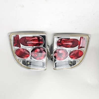 2000-2005 Toyota Celica Tail lights TYC RARE Left + Right Clear Euro - Image 1 of 4