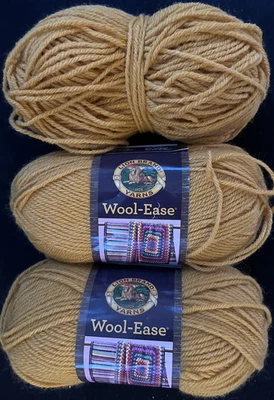 Lot Of 2 1/2 Skeins Lion BRAND Wool-ease Acrylic-Wool Blend Yarn - Color Gold - Image 1 of 2