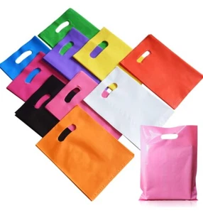 5 Kg. Buste Plastica Manici a Fagiolo misura 35x12x50 cm. - Foto 1 di 3
