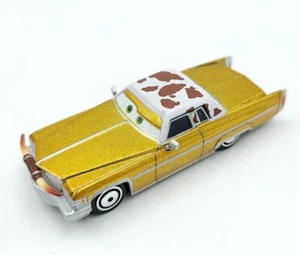 BOLD DISNEY PIXAR 1970'S CADILLAC COUPE DEVILLE METALLIC GOLD W LONGHORN 1:64 VG - Picture 1 of 8