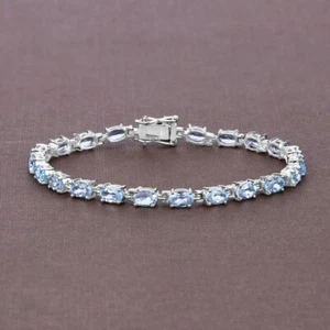 10.5CT Lab-Created Oval Cut Blue Topaz Tennis Bracelet in 14k White Gold Over 7" - Picture 1 of 11