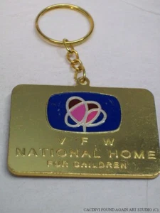 Llavero en muy buen estado con logotipo nacional hogar para niños tono dorado llavero bandera de EE. UU. - Imagen 1 de 5