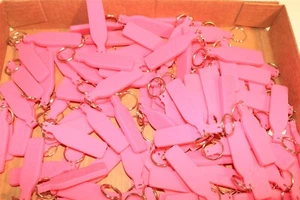 LOT OF 25 SVEDKA VODKA PINK RUBBER KEYCHAINS - Picture 1 of 1