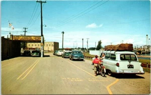 MN Postcard Port of Entry International Falls US Border Old Cars Canada Customs - Picture 1 of 2