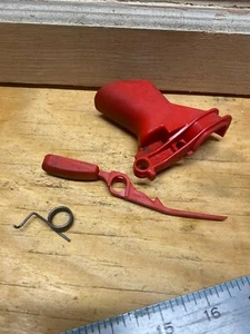 A used Trigger Assembly from a Homelite Versa Tool trimmer power head - Picture 1 of 2