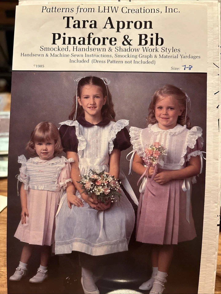 VINTAGE LHW Sewing Pattern Uncut Smocking Tara Apron Pinafore & Bib sz 7-8 - Image 1 of 1