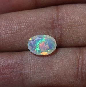1,4 kt 10,8 x 7,6 mm Echter AAA Grün Rot Feuer Äthiopischer Opal Facettiert Oval Edelstein - Bild 1 von 8