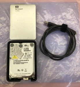 WD Passport 2TB USB 3.0 WD20NMVW-11W68S0 DCX: NW0969W85 DCM: HHCTJBKB NOV 2012 - Bild 1 von 9