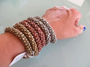 Bracciale elastico pepita con perline tono argento - SPLENDIDO - Foto 1 di 5