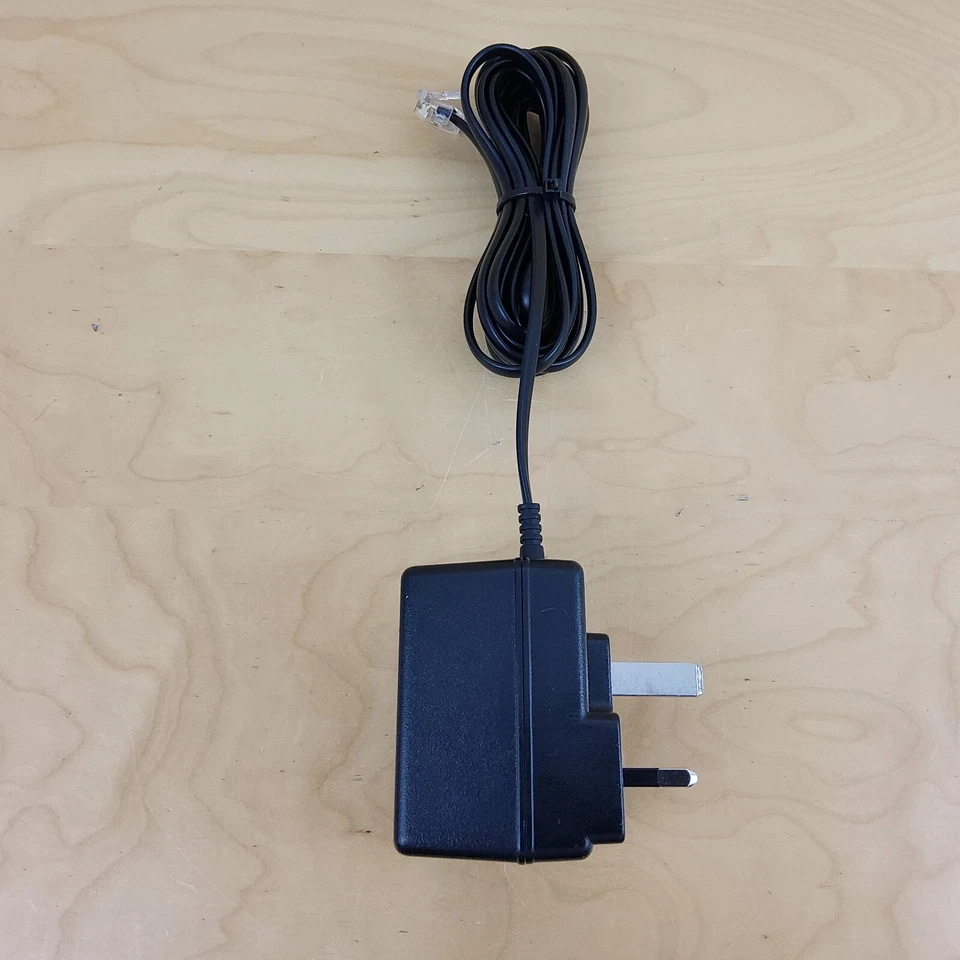 BT 022072 MHH41-08-05 Netzteil Ladegerät Adapter 6,5V 300mA / 9V 150mA - Bild 1 von 4
