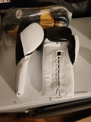 16 oz Black Ans White Boxing Gloves with Hand Wraps Included - Image 1 of 4
