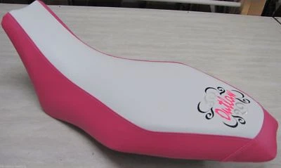 polaris outlaw 90 110 pink white seat cover with logo - Image 1 of 3
