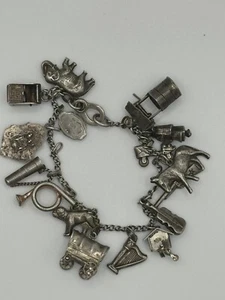 Bettelarmband Sterlingsilber 17 Charms Vintage  - Bild 1 von 7
