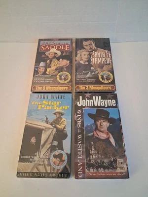 4 VHS: Santa FE Stampede/ Winds of the Wasteland/Pals Of The Saddle/See Descr  - Image 1 of 4