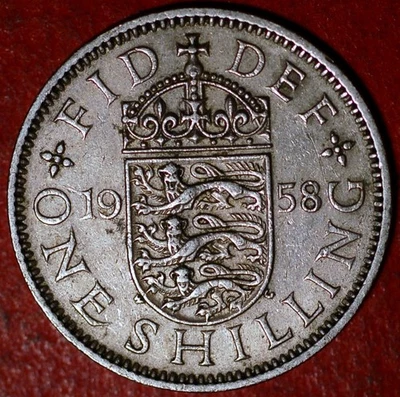 Gran Bretaña Chelín 1958 Victoria KM# 904 Foto 1 de 2