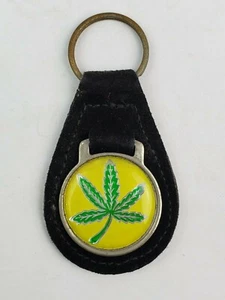 Llavero vintage con logotipo de cuero con logotipo de hoja de marihuana Mary Jane Pot pestaña FOB negro - Imagen 1 de 6